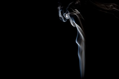 Smoke against black background