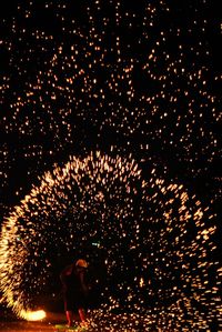 Firework display at night