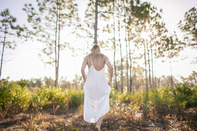 Rear view of woman on swing