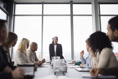 Woman talking during business meeting