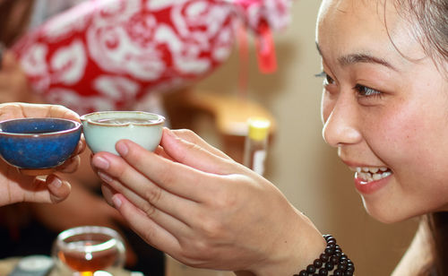 Close-up of woman holding drink