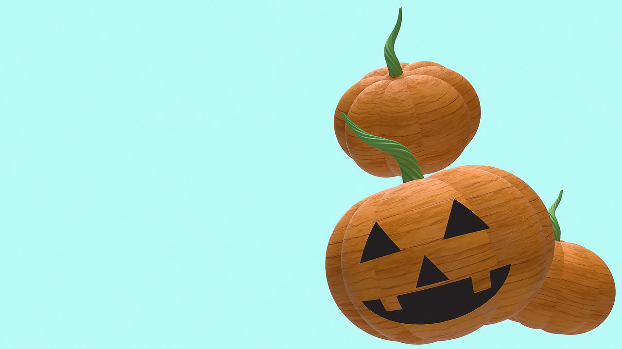 LOW ANGLE VIEW OF PUMPKINS AGAINST SKY