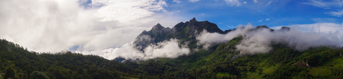 Panoramic view of mountains against sky