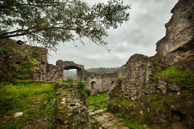 Old ruin building against sky