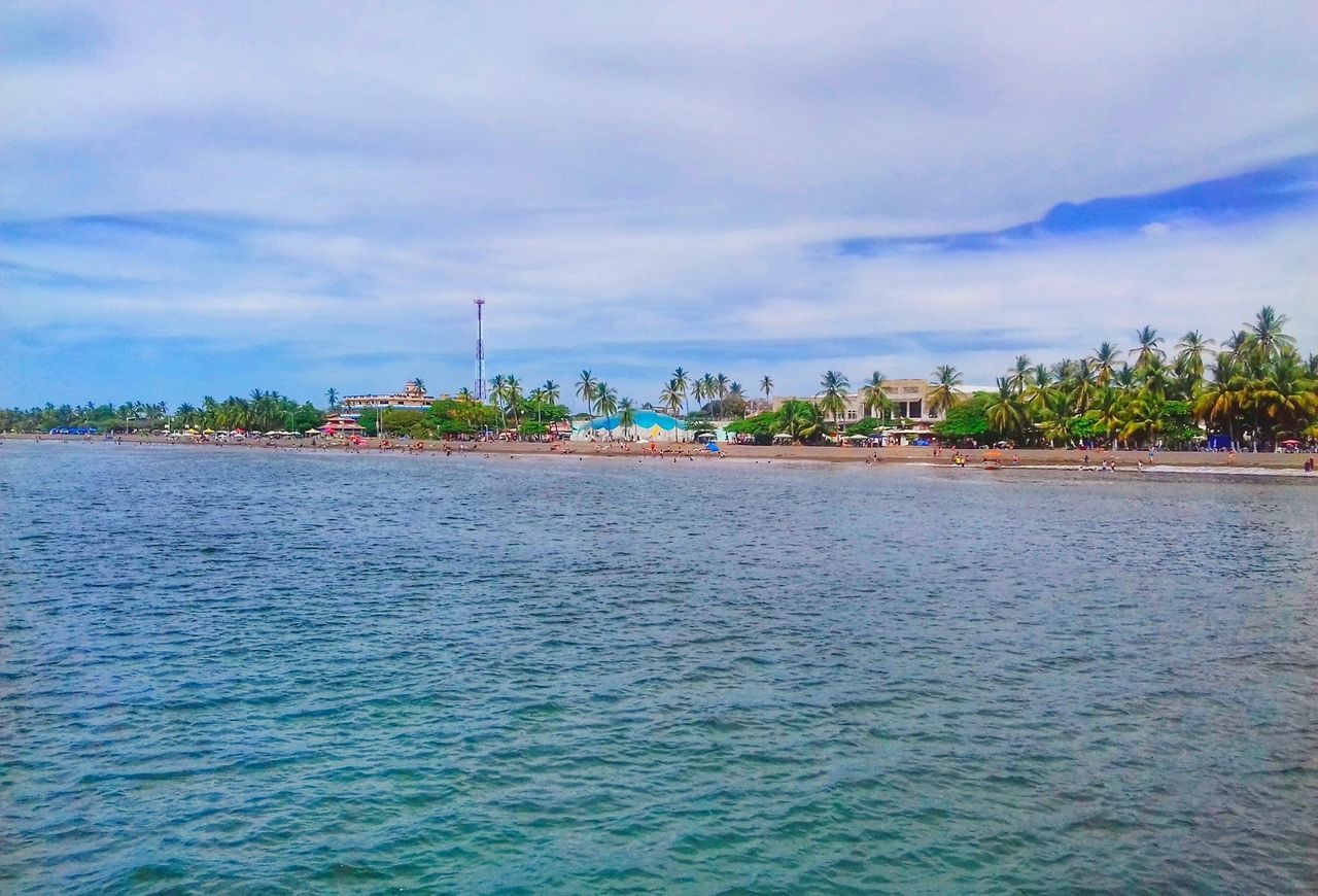 sky, cloud - sky, water, building exterior, outdoors, tree, no people, waterfront, architecture, day, nature, beauty in nature