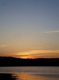 Scenic view of sunset over sea