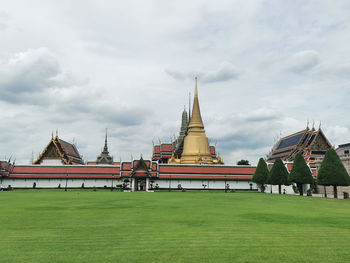 View of temple against building