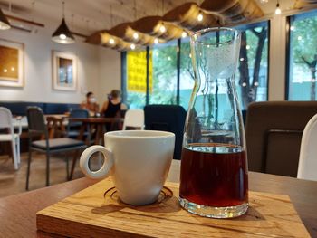 Coffee cup on table in cafe