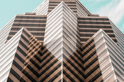 Low angle view of modern building against sky