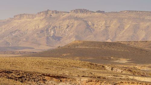 Desert view against rock in ramon crater