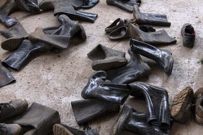 High angle view of old shoes on table