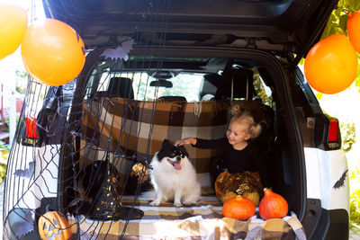 High angle view of people sitting in car