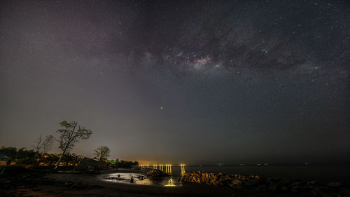 Scenic view of star field against sky at night