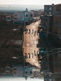 High angle view of text amidst buildings in city