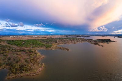 Panoramic view of sea against sky during sunset