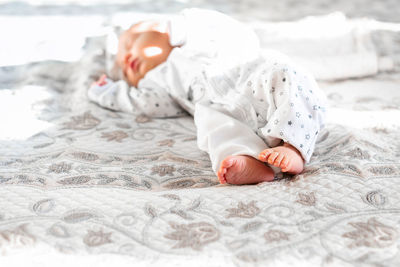 Girl lying on bed