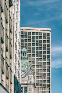 Low angle view of modern building against sky