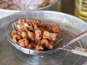 High angle view of meat in container on table