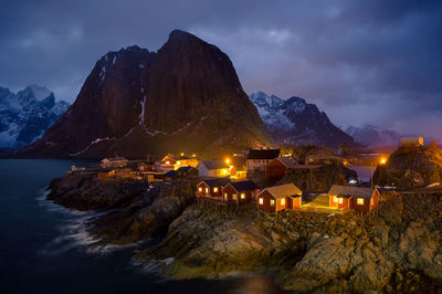 Scenic, dramatic and atmospheric view of a fishermen's island and mountain in lofoten noway 