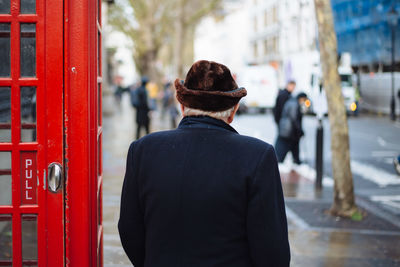 Rear view of woman looking at city