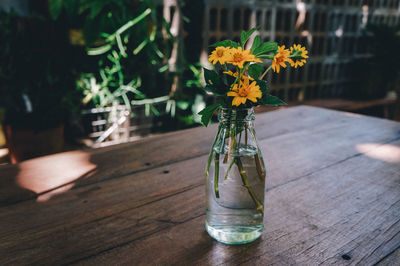 Flower vase on table