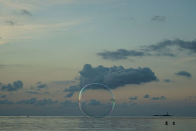 Scenic view of sea at sunset