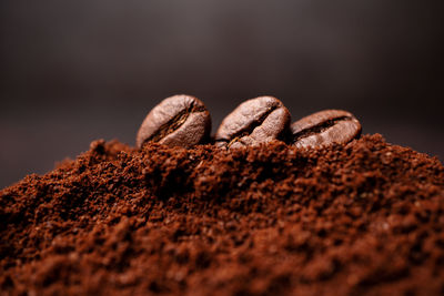 Close-up of coffee beans on table