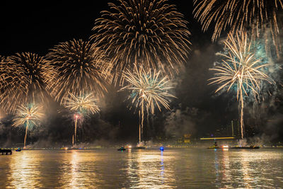 Firework display at night