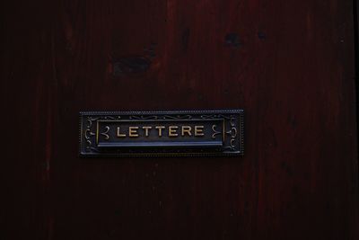 Close-up of text on door