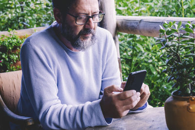 Young woman using mobile phone