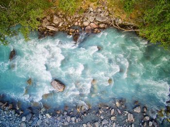 High angle view of rocks in sea