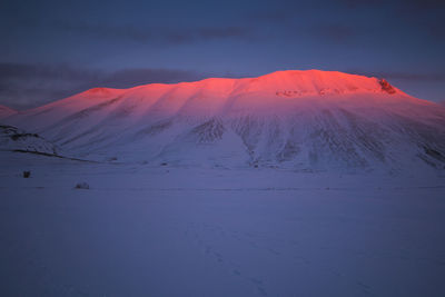 Panoramic view of vettore mountain at dusk with snow in the monti sibillini national park