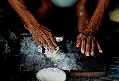 Man holding water splashing