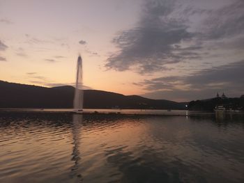 View of lake against cloudy sky