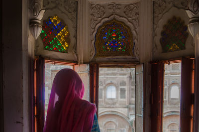 Rear view of woman in church