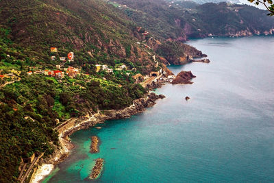 Aerial panoramic view of framura sea bay from hiking trail, liguria, italy