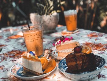 Close-up of ice cream and cake on table