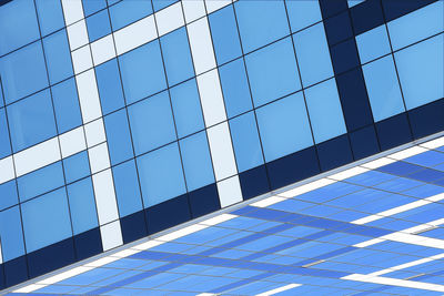 Low angle view of modern glass building