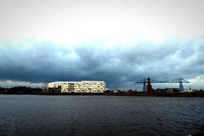 View of buildings against cloudy sky