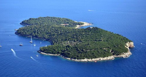 High angle view of boats sailing in sea