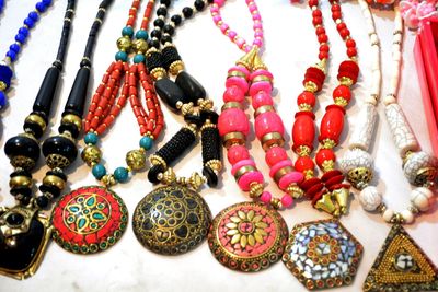 High angle view of necklaces on table at store