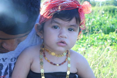 Close-up portrait of cute girl with father