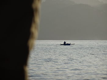 Boat sailing in sea