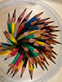 High angle view of multi colored pencils on table