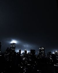 Illuminated cityscape at night