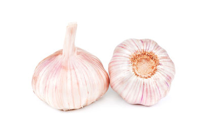 Close-up of garlic against white background