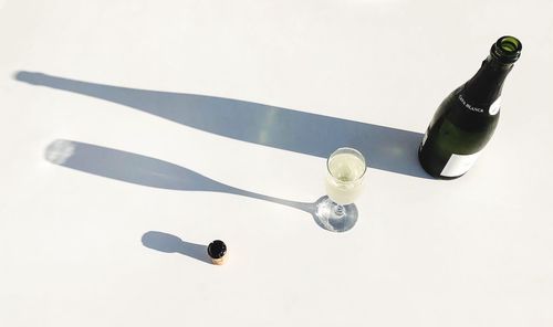 High angle view of wine glass on table