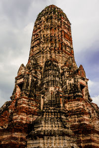 Low angle view of old building in ayutthaya province under the blue sky