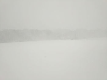 Scenic view of snowy field during winter