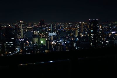 View of city lit up at night